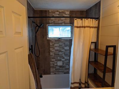 Farmhouse bathroom with shiplap walls