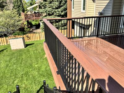 Deck view along railing toward neighborhood