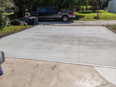 Large concrete parking pad extension
