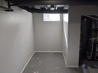 Clean finished basement drywall