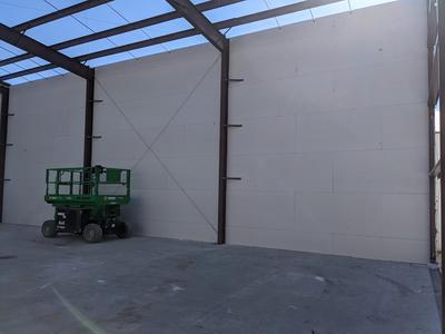Massive commercial exterior sheathing on steel frame