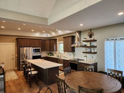 Finished kitchen with large island and open layout