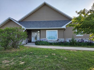 Full house exterior — complete home transformation