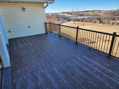 Finished composite deck with lake view — stunning outdoor living