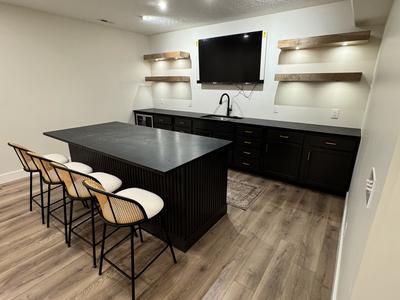 Entertainment bar with LED floating shelves