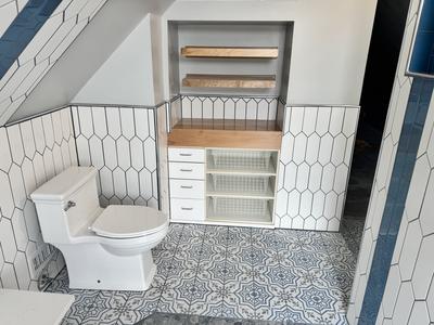 Built-in storage under stairs