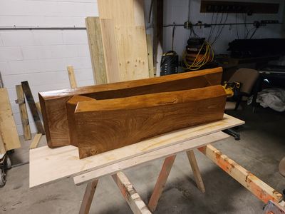 Live-edge wood mantel — raw slab in the shop